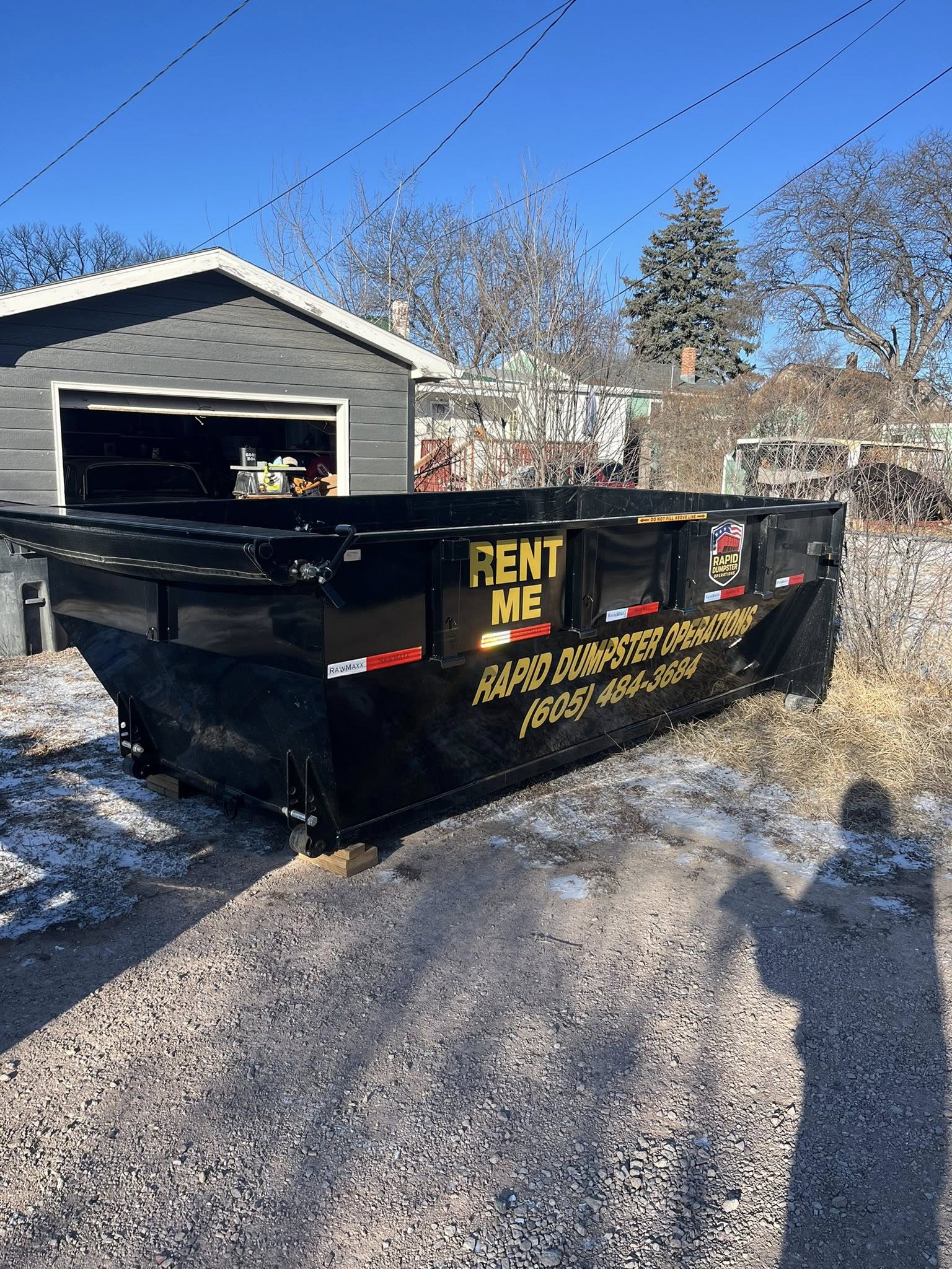 Rapid Dumpster Operations container in use